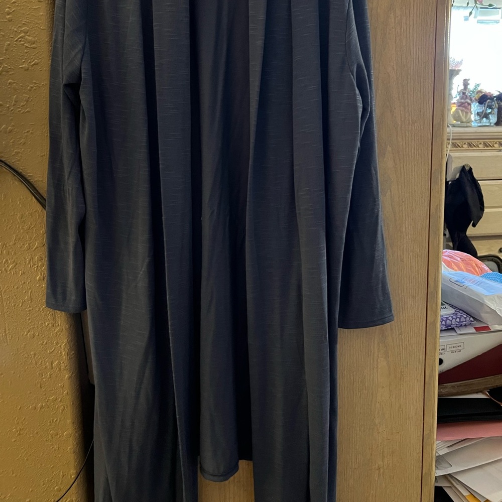 Blue long light weight sweater.